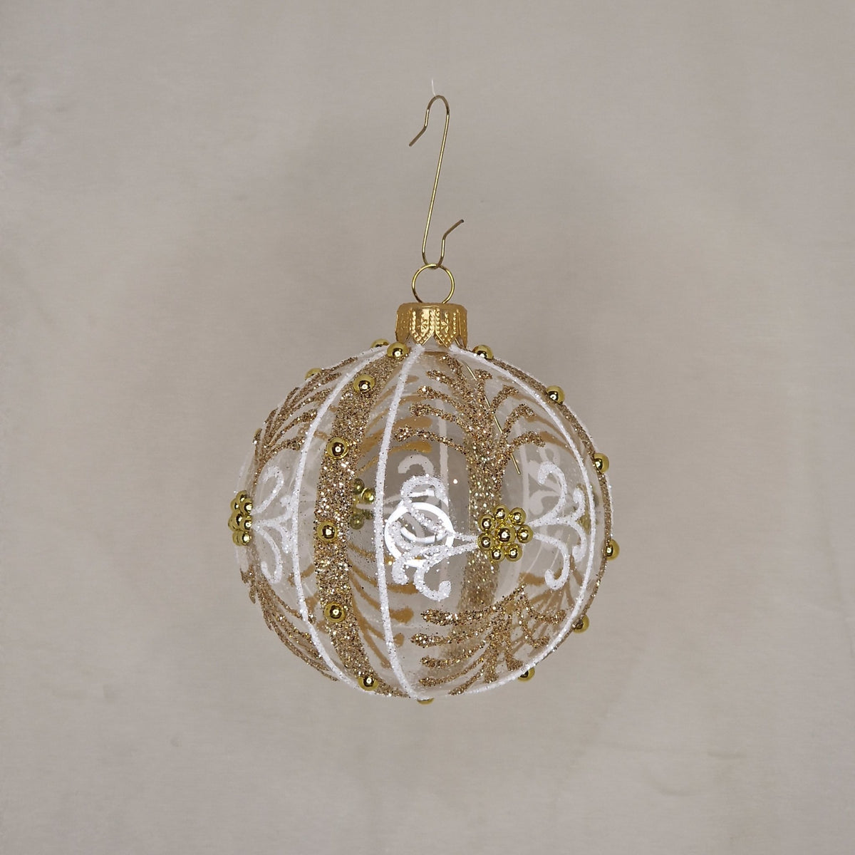 8cm transparent klar kula med mönster i guld och vitt - Julstämning.se