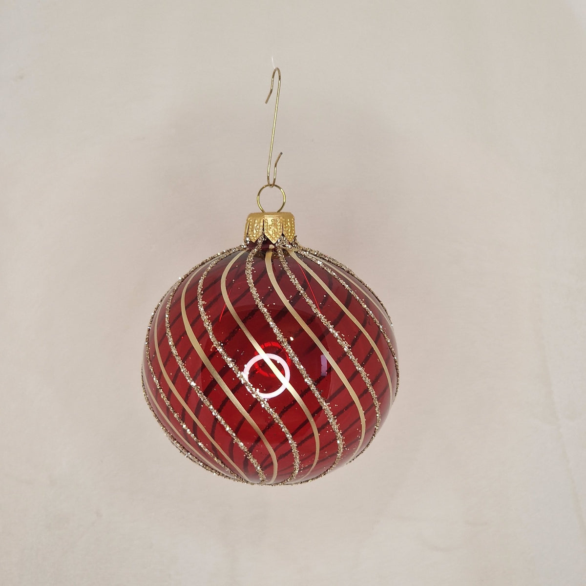 8cm transparent rök-röd med swirl mönster i glitter och guld - Julstämning.se